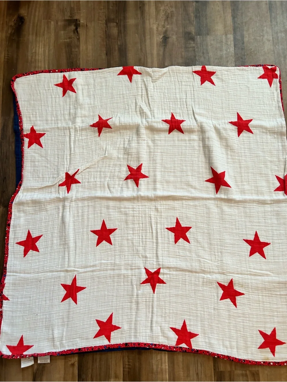 aden + anais Red Star Muslin Baby Blanket on White